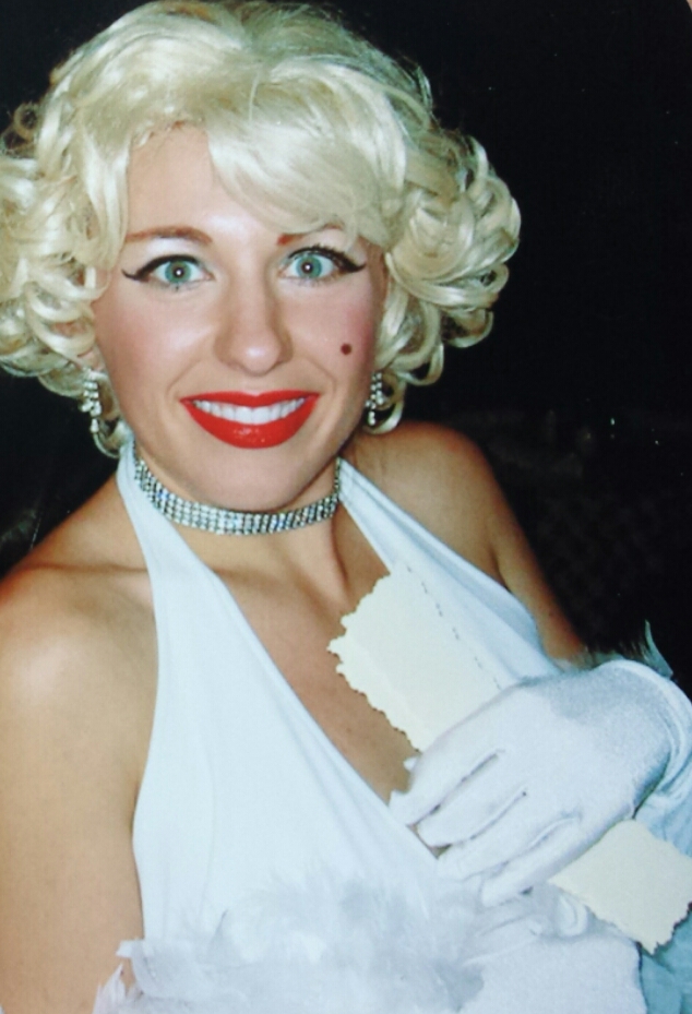 Me, dressed as one of my dinner theatre characters. The character resemebles Marilyn Monroe with her iconic blonde hair and brown mole.