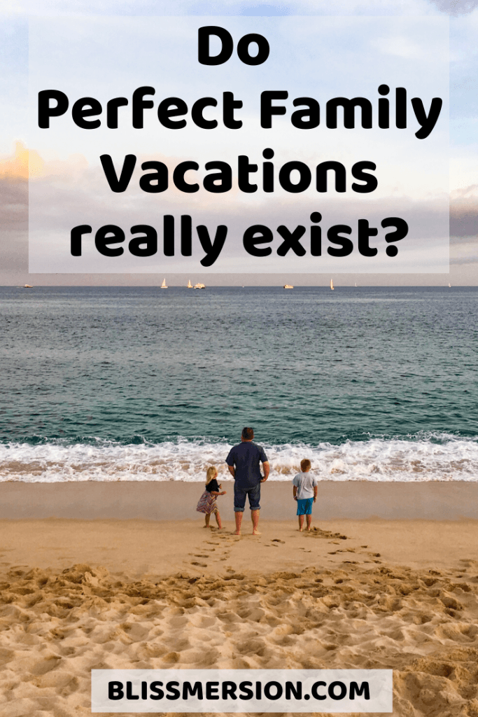 Is it possible to have a perfect family vacation? Pictured, a dad with two kids on either side all stand on the beach, staring into the background, which is the ocean.